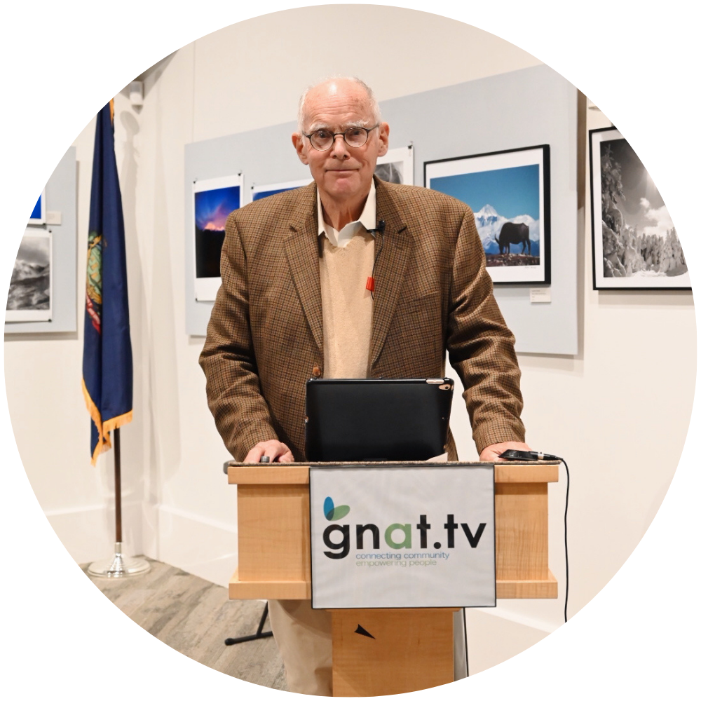 Photograph of Andrew McKeever standing at a podium.