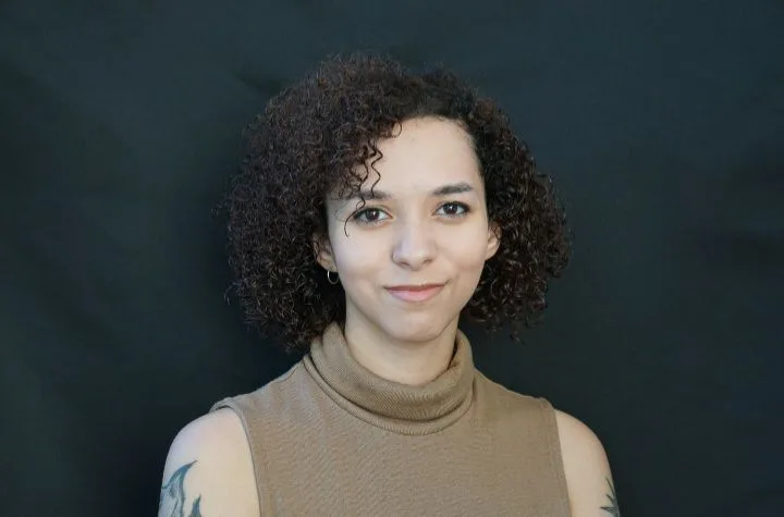 Headshot of Ari Santos.